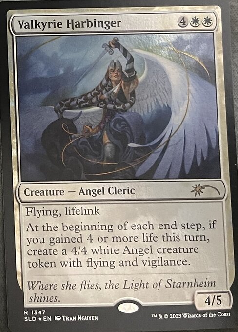 Flying, lifelink
At the beginning of each end step, if you gained 4 or more life this turn, create a 4/4 white Angel creature token with flying and vigilance.