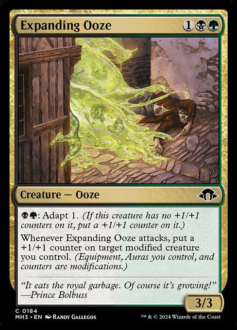 {B}{G}: Adapt 1. (If this creature has no +1/+1 counters on it, put a +1/+1 counter on it.)
Whenever Expanding Ooze attacks, put a +1/+1 counter on target modified creature you control. (Equipment, Auras you control, and counters are modifications.)